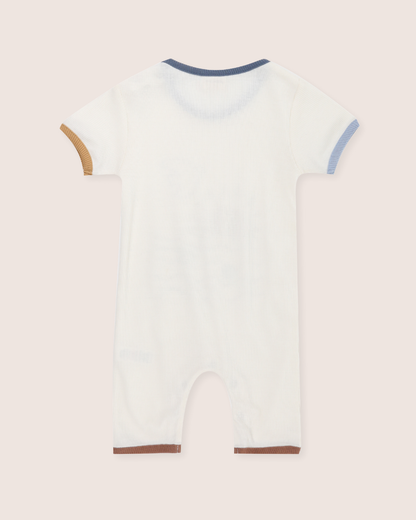 Light blue baby romper with brown accents on a beige background
