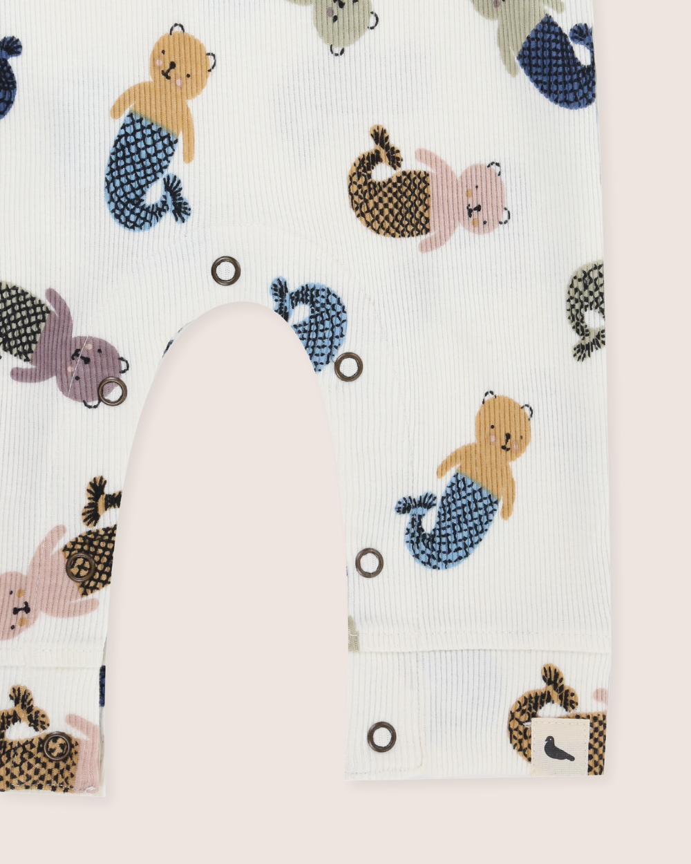Baby romper with mermaid-themed animal print on a white background