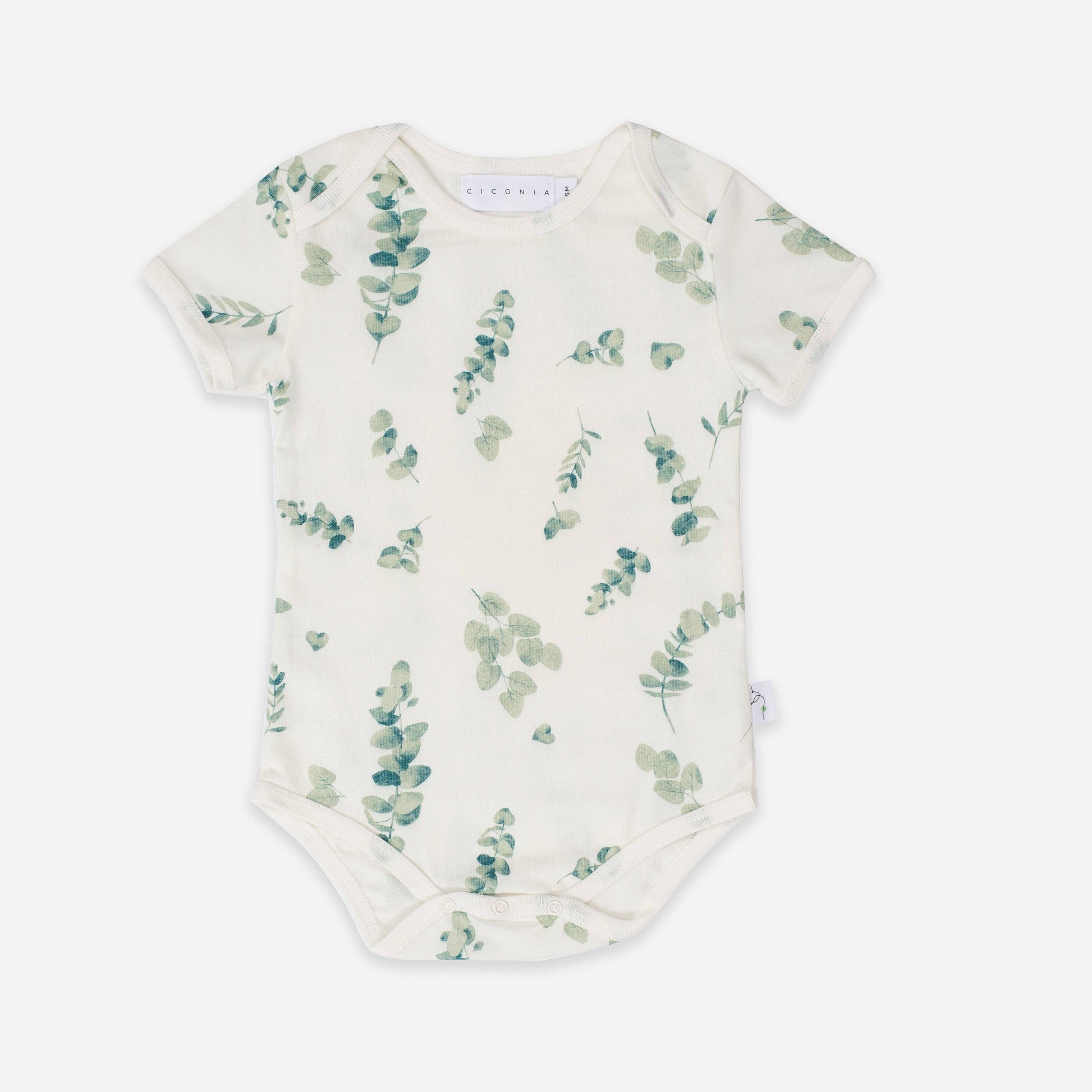 Baby onesie with eucalyptus leaf pattern on a white background