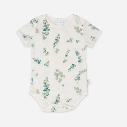 Baby onesie with eucalyptus leaf pattern on a white background