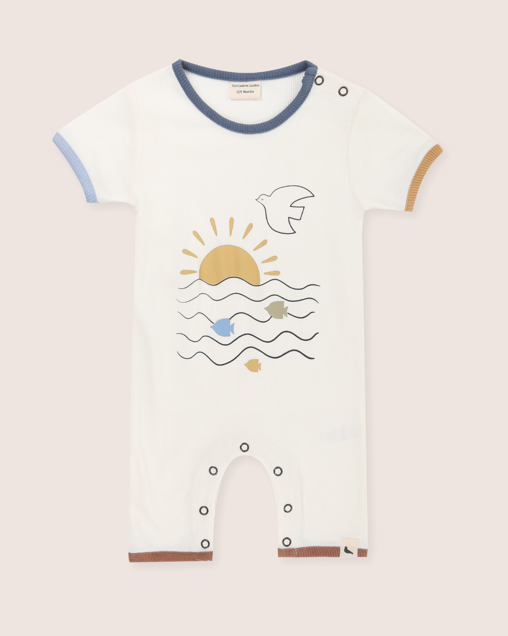 Baby's romper with a sun and wave design on a plain background