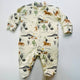 Baby sleepsuit with desert animal pattern on a light gray background