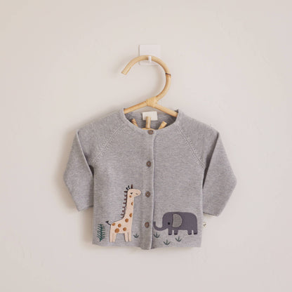 Gray baby cardigan with animal appliqués on a wooden hanger against a light background